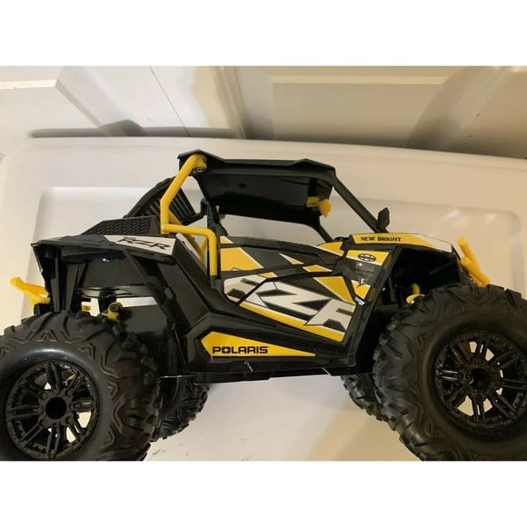 New Bright RC 1:14 Scale Polaris RZR ATV - Yellow no remote no battery cover 13” - Picture 12 of 12
